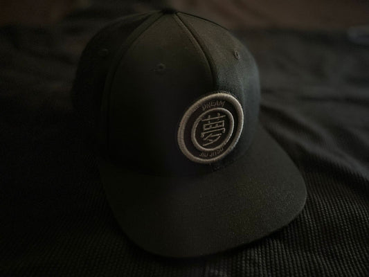 Gorra Dream Jiu Jitsu logo gris